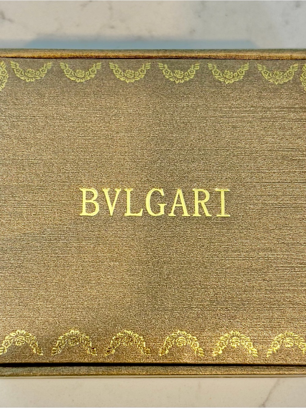 Bulgari Metallic Gold Decorative Box with Embossed Trim